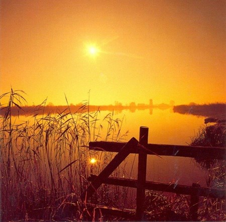 Hazy Sunrise over River Bure